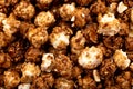 Caramel candy popcorn background. Scattered popcorn texture background Royalty Free Stock Photo