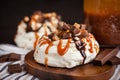 Caramel and chocolate Pavlova meringue cake