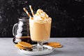 Caramel coffee latte in a dessert glass