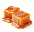 Caramel cubes with dripping sauce on white background