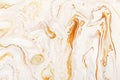 Caramel dynamic and fluid raster texture. Abstract acrylic paints mixt color background. Dyeing, liquid flow surface