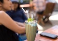 Caramel frappe coffee and mint leaf Royalty Free Stock Photo