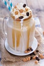 Caramel frappuccino with syrup Royalty Free Stock Photo