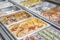 Caramel Gelato. Flavors various ice cream in Rome, Italy. Italian gelateria. Assortment of colorful gelato on cafe Royalty Free Stock Photo