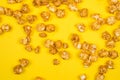 Caramel pop corn on yellow background. Copy space Royalty Free Stock Photo