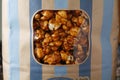 Caramel popcorn in the bag.