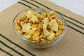 Caramel popcorn and dried pineapple chunk mixture