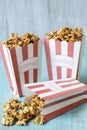 Caramel Popcorn with One Spilling Royalty Free Stock Photo