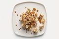 Caramel Popcorn On Plate, White Background. Generative AI Royalty Free Stock Photo