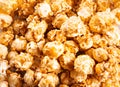 Caramel popcorn snack background texture. Close up. Top view. Royalty Free Stock Photo