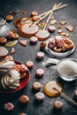 Caramel, sweets, sugar, marshmallows on a dark background.
