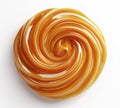 Caramel swirl texture top view isolated on white background Royalty Free Stock Photo