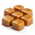 Caramel toffees on white background Royalty Free Stock Photo