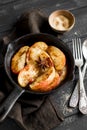 Caramelized apples with cinnamon in the pan Royalty Free Stock Photo