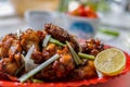 Caramelized asian chicken wings with selective focus