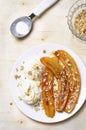 Caramelized Bananas, Ice-cream and Chopped Nuts Dessert Royalty Free Stock Photo