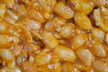 Caramelized nuts fried in honey - granola peanut bar - close up, top view Royalty Free Stock Photo