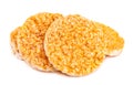Caramelized rice-corn crispbread, isolated on white background. Sweet puffed whole grain crispbread