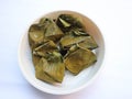 Carang gesing is Javanese traditional food made from Banana steamed in banana leaf with coconut milk, add pandanus leaf for its
