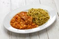 Carapulcra con sopa seca, peruvian dried potato stew with basil pasta Royalty Free Stock Photo