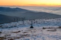 Caras Severin, Romania. chairlift that climbs the small mountain in the evening at sunset