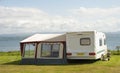 Caravan with awning. Royalty Free Stock Photo