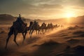 The caravan of camels goes on the hot waterless desert with barkhans on a sunset.