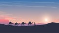 caravan of camels at sunset arabic desert Royalty Free Stock Photo