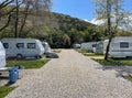 Caravan Camping Site, Caravans in a Camp Site, Relaxing Campsite in nature, Travel Trailers, Trailer park, Summer Camp. Royalty Free Stock Photo