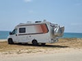 caravan car by the beach in summer holidays modern