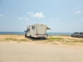 caravan car by the beach in summer holidays modern