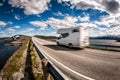 Caravan car RV travels on the highway Atlantic Ocean Road Norway Royalty Free Stock Photo