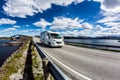 Caravan car RV travels on the highway Atlantic Ocean Road Norway Royalty Free Stock Photo