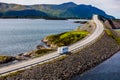 Caravan car RV travels on the highway Atlantic Ocean Road Norway Royalty Free Stock Photo