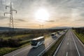 Caravan or convoy of busses on highway Royalty Free Stock Photo