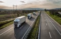 Caravan or convoy of trucks on highway