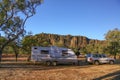 Caravan and four wheel drive vehicle at camping area at Windjana Gorge in the Kimberley region of Western Australia Royalty Free Stock Photo