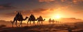 a caravan of Indian camels, led by experienced camel drivers, traversing the mesmerizing desert sand dunes at sunset Royalty Free Stock Photo