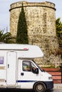 Caravan at old tower, Algarrobo town, Spain