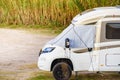 Caravan with thermal screen blind and leveling system Royalty Free Stock Photo