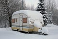 Caravan Trailer Covered in Snow during Winter