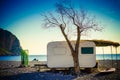 Caravan trailer on sunny beach