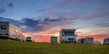 Caravans and cars campsite sunset