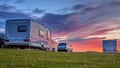 Caravans and cars sunset Royalty Free Stock Photo