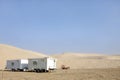 Caravans near sand dunes Royalty Free Stock Photo