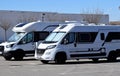 caravans parked in a public parking lot