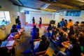 Caraz, Peru, July 12, 2014:  Humble school with teenage students teaching standing and sitting at their desks Royalty Free Stock Photo