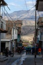 Caraz, Peru, July 19, 2010: typical street of Peruvian town with motorcycle cars and police officers