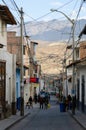 Caraz, Peru, July 19, 2010: Typical street of Peruvian village in the mountains with people doing daily life