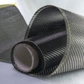 Carbon fiber composite raw material background Royalty Free Stock Photo